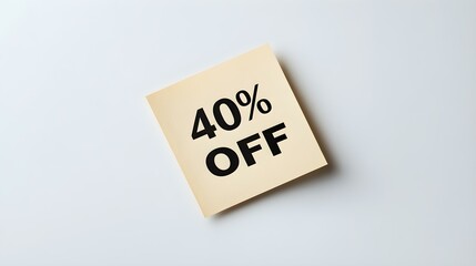 Black '40% OFF' Text on a Ivory Square Paper Note. White Background with Copy Space