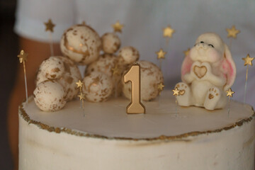 Cute One-Year-Old Birthday Cake with Bunny and Decorative Stars