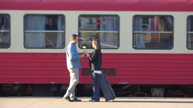 Lovers couple meeting in the train station