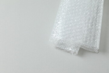 Obraz premium Bubble wrap on gray background