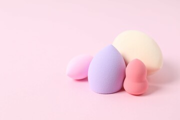 Beauty blender on a color background. Bright sponges for make-up cosmetics. Make-up products. Beauty concept