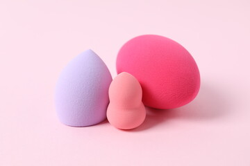 Beauty blender on a color background. Bright sponges for make-up cosmetics. Make-up products. Beauty concept