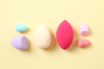 Beauty blender on a color background. Bright sponges for make-up cosmetics. Make-up products. Beauty concept