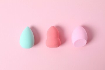 Beauty blender on a color background. Bright sponges for make-up cosmetics. Make-up products. Beauty concept