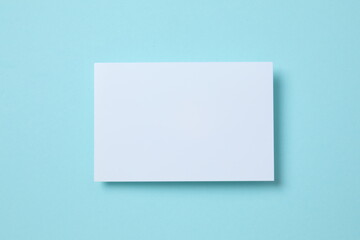 Paper card on color background