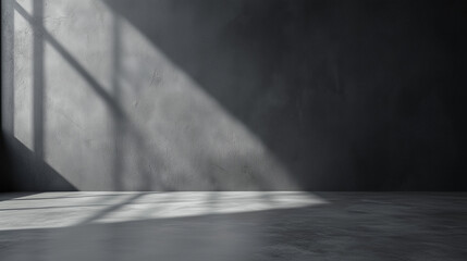 Fototapeta premium Matte grey. Grey background. Light from a window in a gray empty room