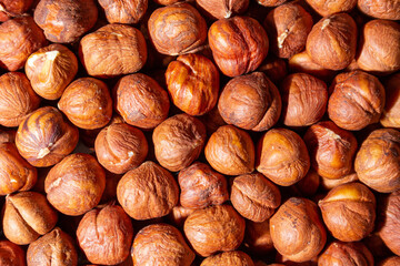 Scattered Peeled Hazelnut - Top View. Background from Hazelnuts. Natural High-Calorie Snacks