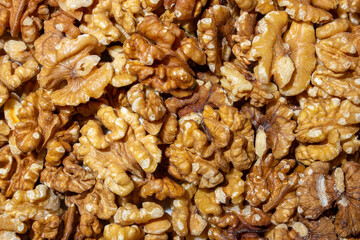 Scattered Shelled Walnuts. Background from Walnut. Natural High-Calorie Snacks
