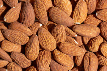 Scattered Almonds. Background from Almond Nuts. Natural High-Calorie Snacks