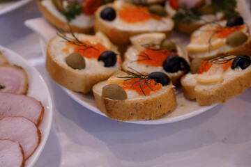 Gourmet Canapes with Cream Cheese, Caviar, and Garnishes