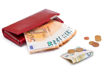Red Leather Women Purse with Different Euro Banknotes and Euro Cent Coins - Isolated on White Background. A Wallet Full of European Union Paper Money Symbolizing Wealth and Success - Isolation