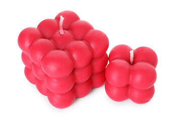 Two red bubble candles isolated on white