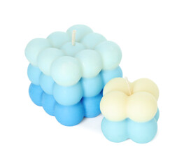 Two beautiful bubble candles isolated on white