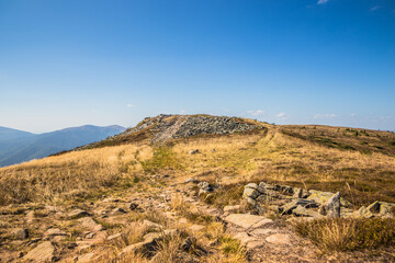 The Stunning and Scenic Mountain Ridge Beneath a Clear Blue Sky and Endless Horizons