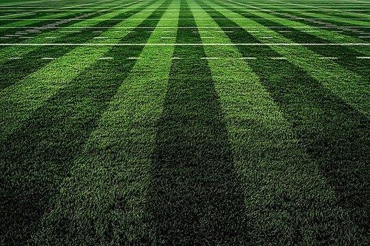 Expansive American football field with space for custom messages on lush green turf