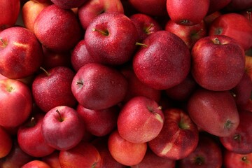 Fresh ripe red apples as background, top view