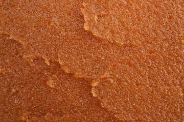 Sample of natural body scrub as background, closeup