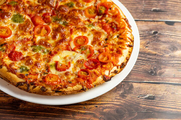 Vegetarian pizza on wooden background