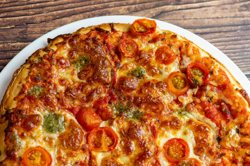 Vegetarian pizza on wooden background