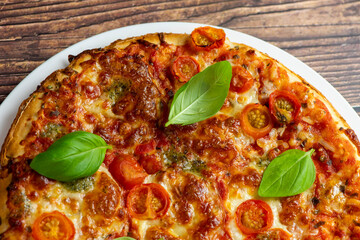 Vegetarian pizza on wooden background