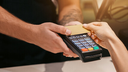 Credit Card Payment. Unrecognizable Girl Cardholder Paying For Take-Away Coffee In Cafeteria....