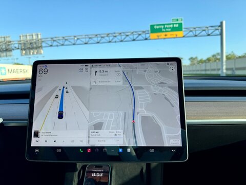 The information screen with full self drive on a Tesla while driving.