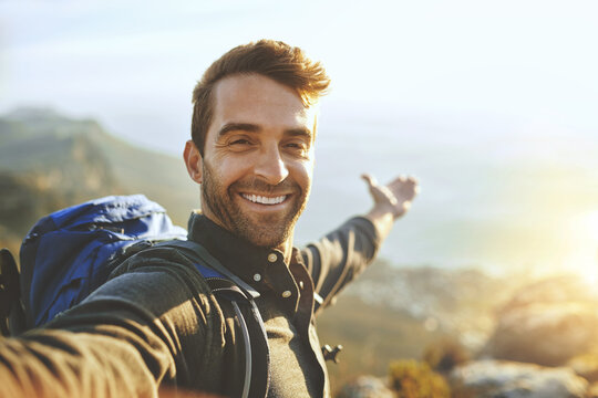 Man, selfie and mountain with portrait outdoor for fitness adventure, photography and social media post. Hiker, profile picture and trekking with hiking memory, nature blog and travel journey of trip