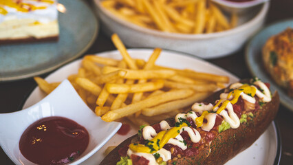 Restaurant meal aesthetic hot dog and chips french fries
