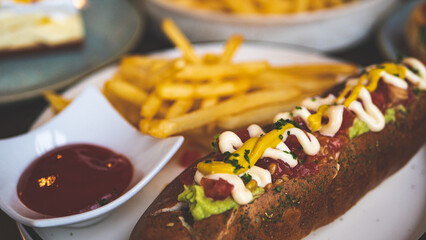 Restaurant meal aesthetic hot dog and chips french fries
