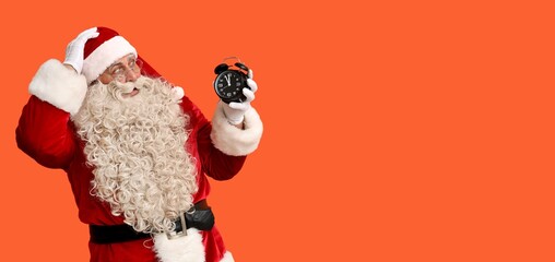 Shocked Santa Claus with alarm clock on orange background with space for text
