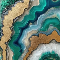 A close-up of a vibrant, layered agate stone featuring teal, gold, and white patterns.