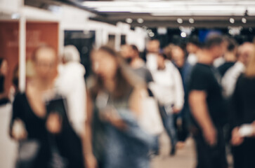 Abstract blurred people at exhibition hall of expo event trade show. Business convention show or job fair. Business concept background
