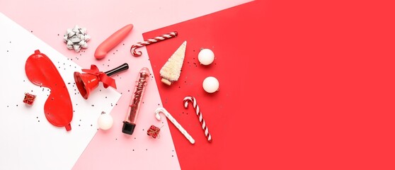 Christmas decorations and sex toys on color background with space for text, top view