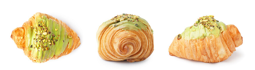 Set of tasty croissants on white background