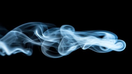 Fototapeta premium Elegant Blue Smoke Flowing Against Black Background