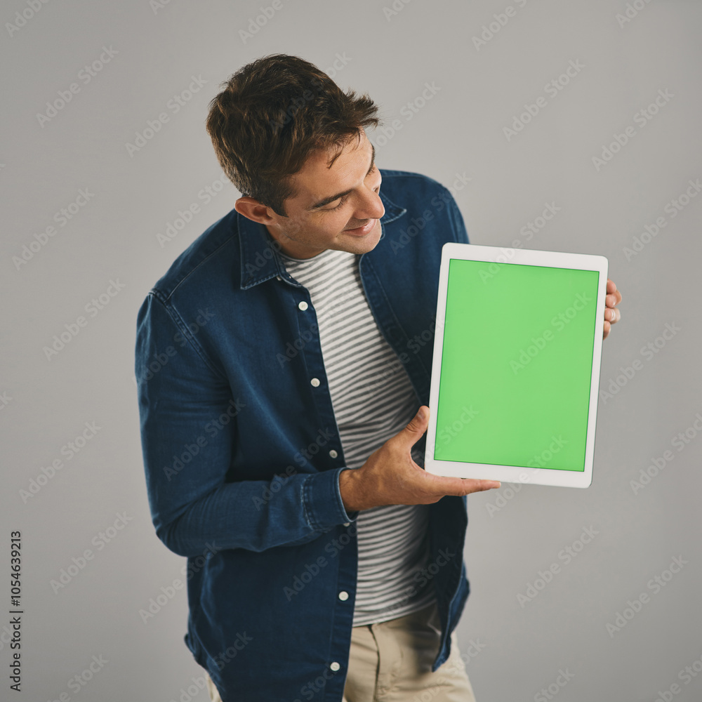 Poster green screen, smile and tablet with man in studio isolated on gray background for app download or ma