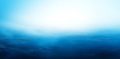 Blue sky with white clouds and sun in the background.