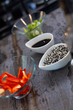 Colorful ingredients for cuisine with sesame seeds and soy sauce, at home