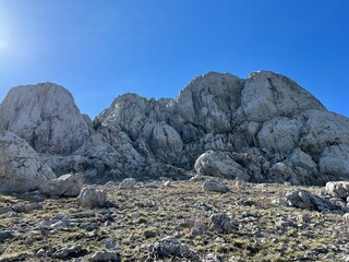 Rocky ridge of Tulove grede or karst mountain peak of Tulovice - Velebit Nature Park, Croatia (Stjenoviti greben Tulove grede ili krški planinski vrh Tulovice - Park prirode Velebit, Hrvatska)