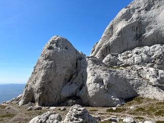 Rocky ridge of Tulove grede or karst mountain peak of Tulovice - Velebit Nature Park, Croatia (Stjenoviti greben Tulove grede ili krški planinski vrh Tulovice - Park prirode Velebit, Hrvatska)