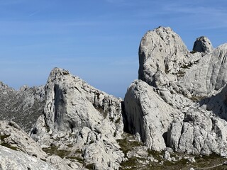 Rocky ridge of Tulove grede or karst mountain peak of Tulovice - Velebit Nature Park, Croatia (Stjenoviti greben Tulove grede ili krški planinski vrh Tulovice - Park prirode Velebit, Hrvatska)