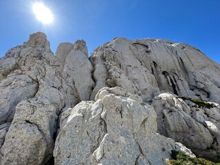 Rocky ridge of Tulove grede or karst mountain peak of Tulovice - Velebit Nature Park, Croatia (Stjenoviti greben Tulove grede ili krški planinski vrh Tulovice - Park prirode Velebit, Hrvatska)
