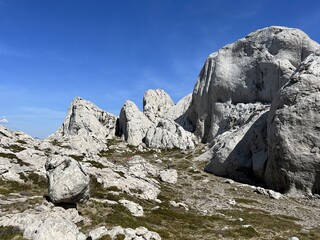 Rocky ridge of Tulove grede or karst mountain peak of Tulovice - Velebit Nature Park, Croatia (Stjenoviti greben Tulove grede ili krški planinski vrh Tulovice - Park prirode Velebit, Hrvatska)