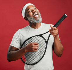 Happy, fitness and black man with racket, studio and silly with equipment for tennis, fun and...