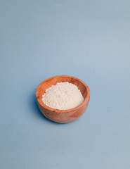 flour served in a wooden bowl with 45 degrees view 