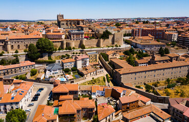Aerial view of cityscape of fortified city of Avila with its town walls and ancient Cathedral of...