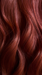 Fototapeta premium Close-up of wavy brown hair with rich color and soft curls showing off texture and vibrancy.Suitable for hair care product marketing, beauty salon concept.