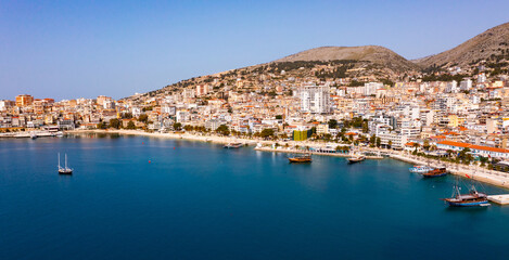 Fototapeta premium Picturesque aerial scenery of Saranda city at Albanian Ionian Sea coast