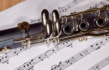 Close up of a Clarinet on Sheet Music
