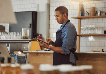 Businessman, barista and digital with tablet for cafe, online service or stock management with...